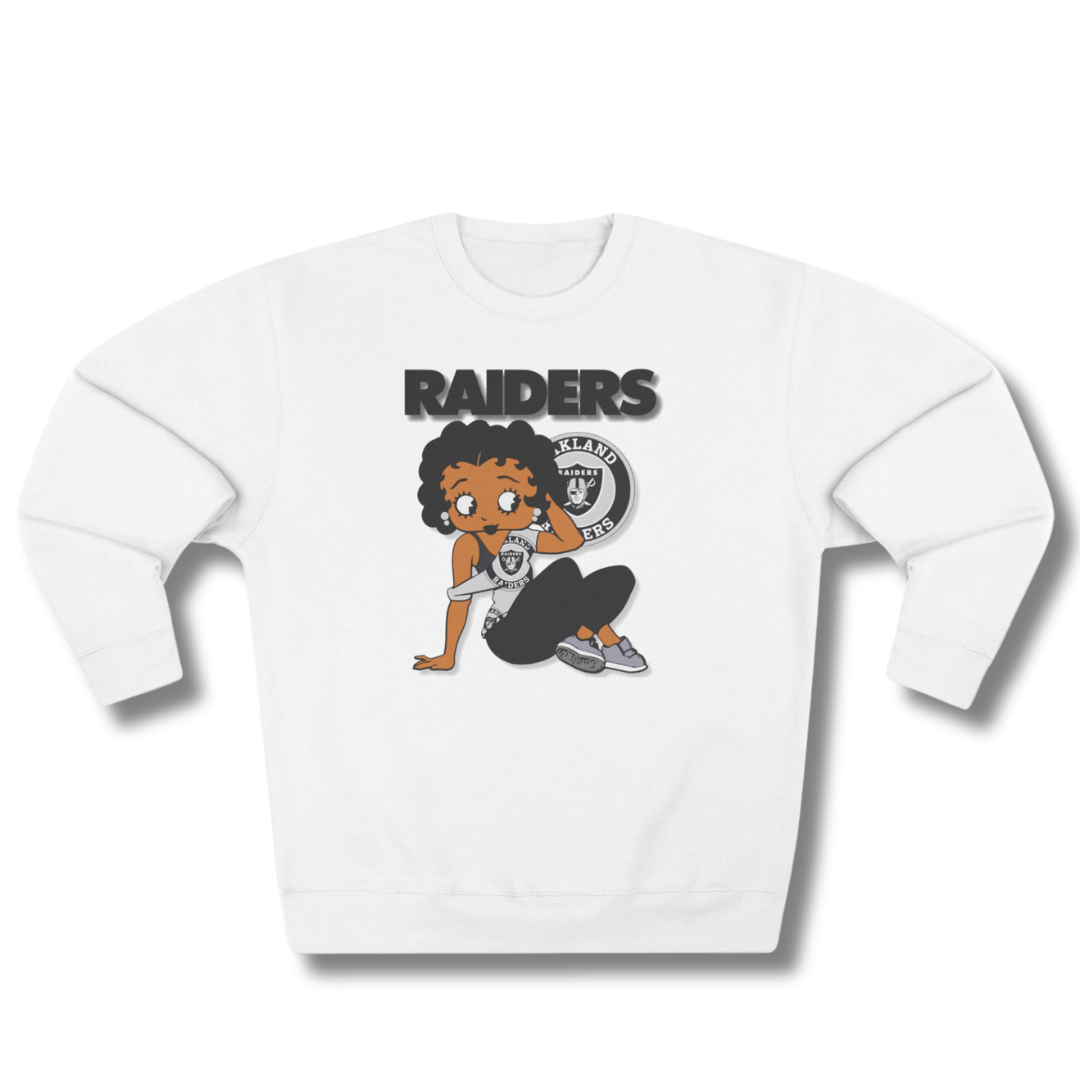 Vintage-Sealed The Hottest Rawest Sneakers & Apparel Clothing Store Around Online. Betty B. RAIDERS (3D) Women’s Sweatshirt – Cozy Comfort Meets Game Day Pride [White] US Sizes [S-2XL].